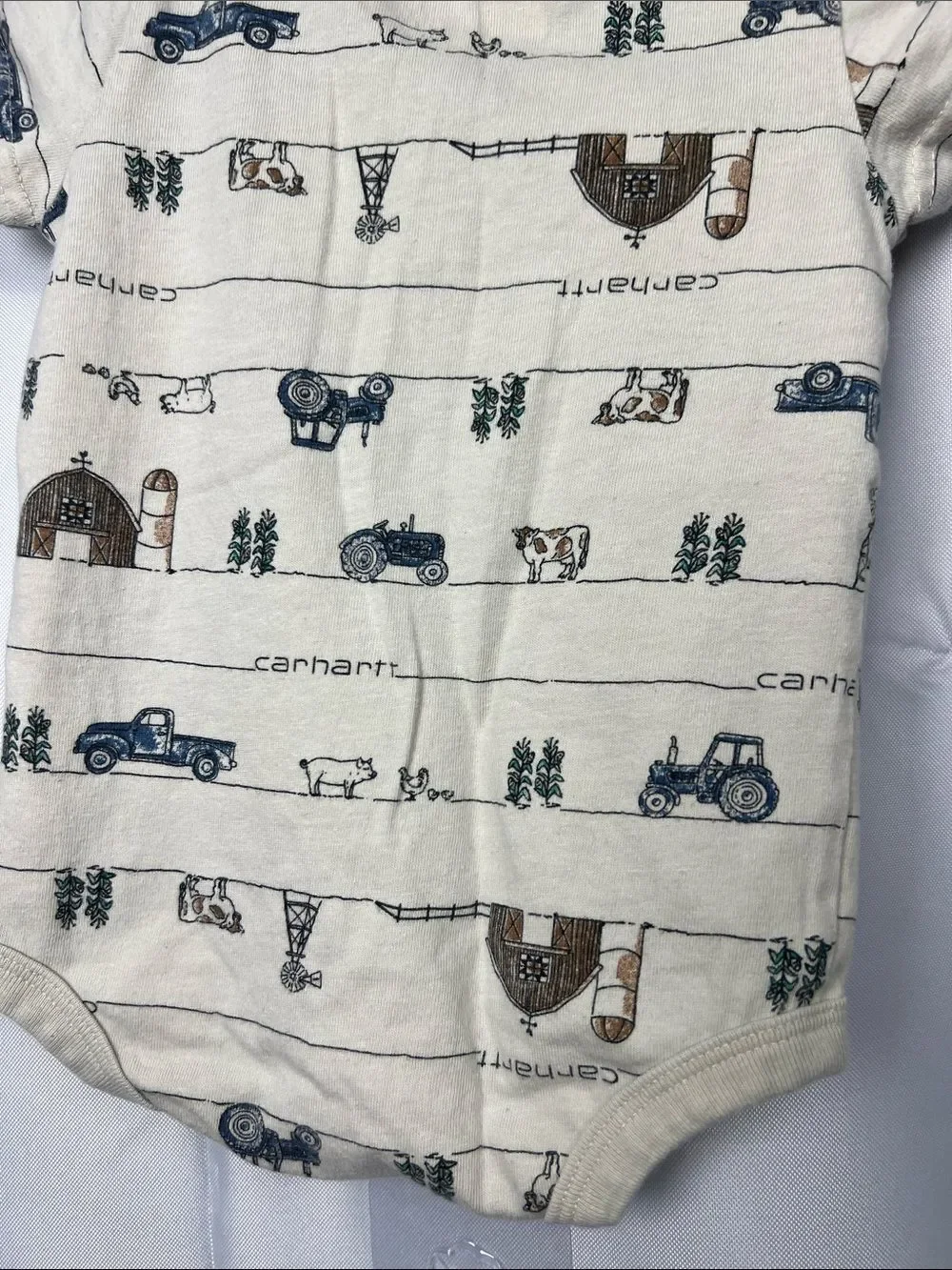 Carhartt tan farm print one piece Henley pocket tee. Size 6 months